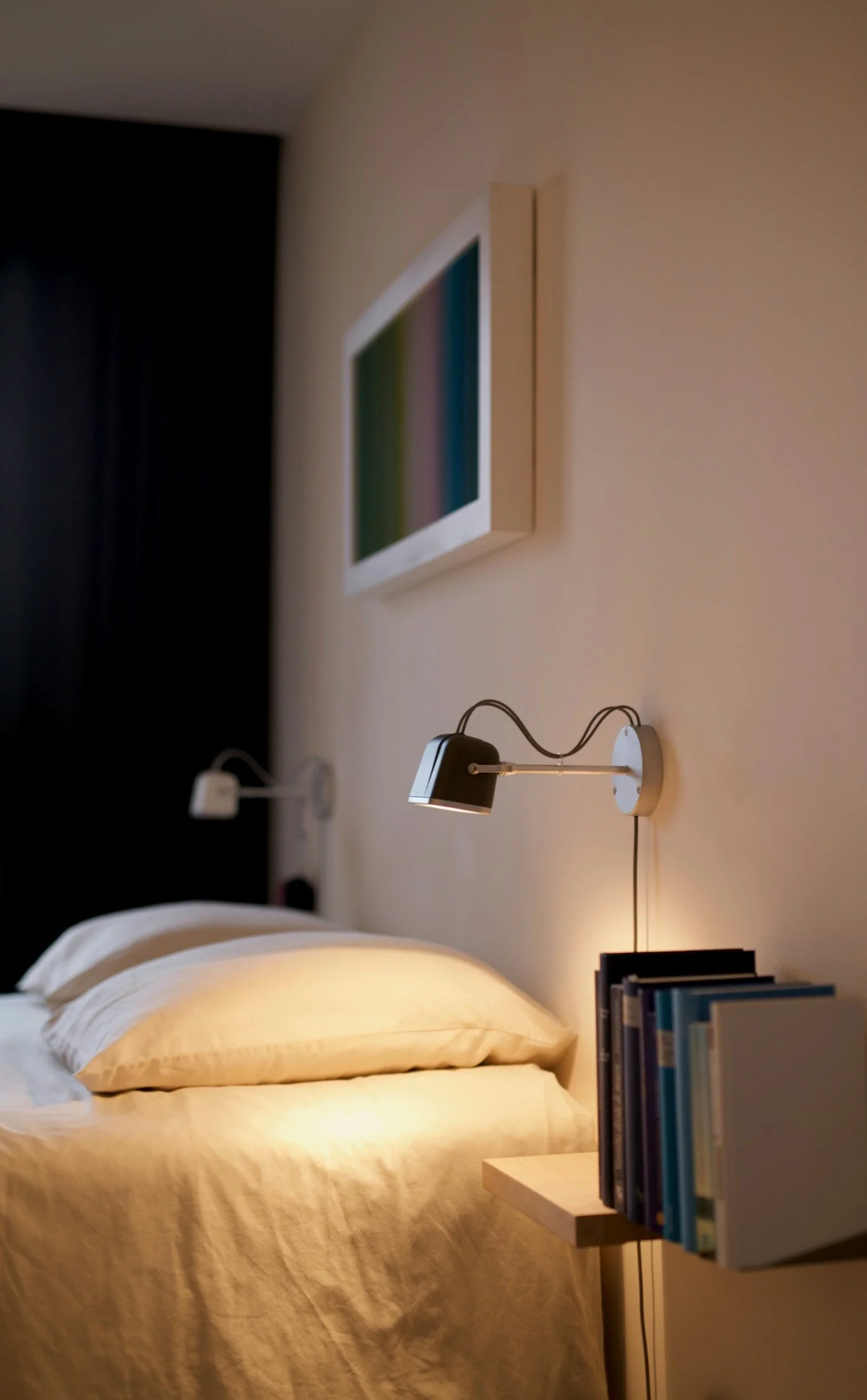 Minimalist desk lamp on wooden surface, warm light